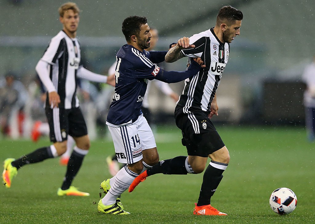 MELBOURNE, AUSTRALIA - JULY 23:  Ben Khalfallah of the Victory (L) and Luca Marrone of Juventus compete for the ball during the 2016 International Champions Cup Australia match between Melbourne Victory FC and Juventus FC at Melbourne Cricket Ground on Ju