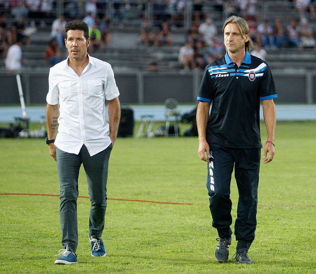 COSENZA, ITALY - AUGUST 06:  Head coach of Crotone Davde Nicola with head coach of Atletico de Madrid Diego Pablo Simeone during a pre-season friendly match between FC Crotone and Club Atletico de Madrid at Stadio Comunale Gigi Marulla on August 6, 2016 i