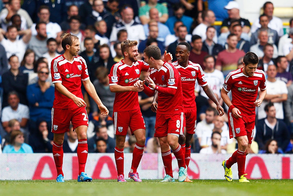 LONDON, ENGLAND - SEPTEMBER 21:  James Morrison (2nd L) of West Brom celebrates with teammates after scoring the opening goal during the Barclays Premier League match between Tottenham Hotspur and West Bromwich Albion at White Hart Lane on September 21, 2