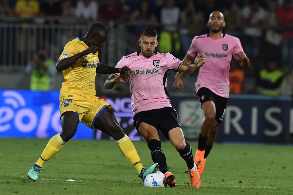 FROSINONE, ITALY - JUNE 16: Moussa Saib Kone' (L) of Frosinone and Aleksandar Trajkovski of Palermo compete for the ball during the serie B playoff match final between Frosinone Calcio v US Citta di Palermo at Stadio Benito Stirpe on June 16, 2018 in Fros